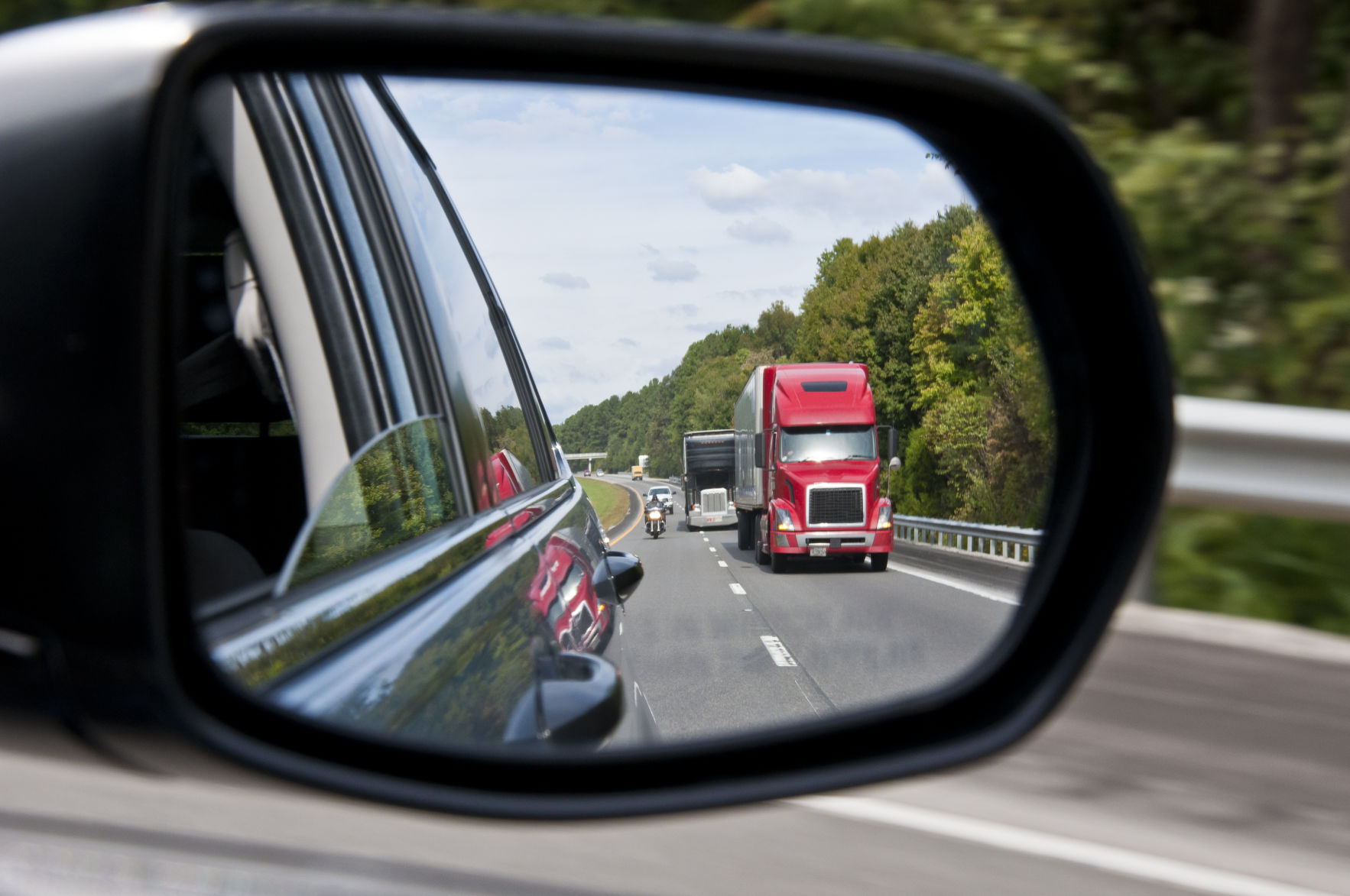 Interstate Traffic In The Rear View Mirror